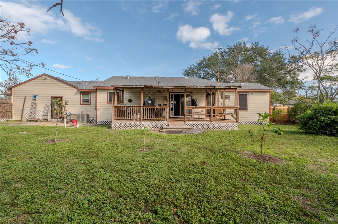 1201 Devon Drive Corpus Christi, TX 78404 - Photo 20 of 23 a front view of a house with garden