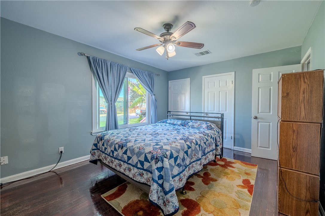 1201 Devon Drive Corpus Christi, TX 78404 - Photo 9 of 23 a bedroom with a bed and a window