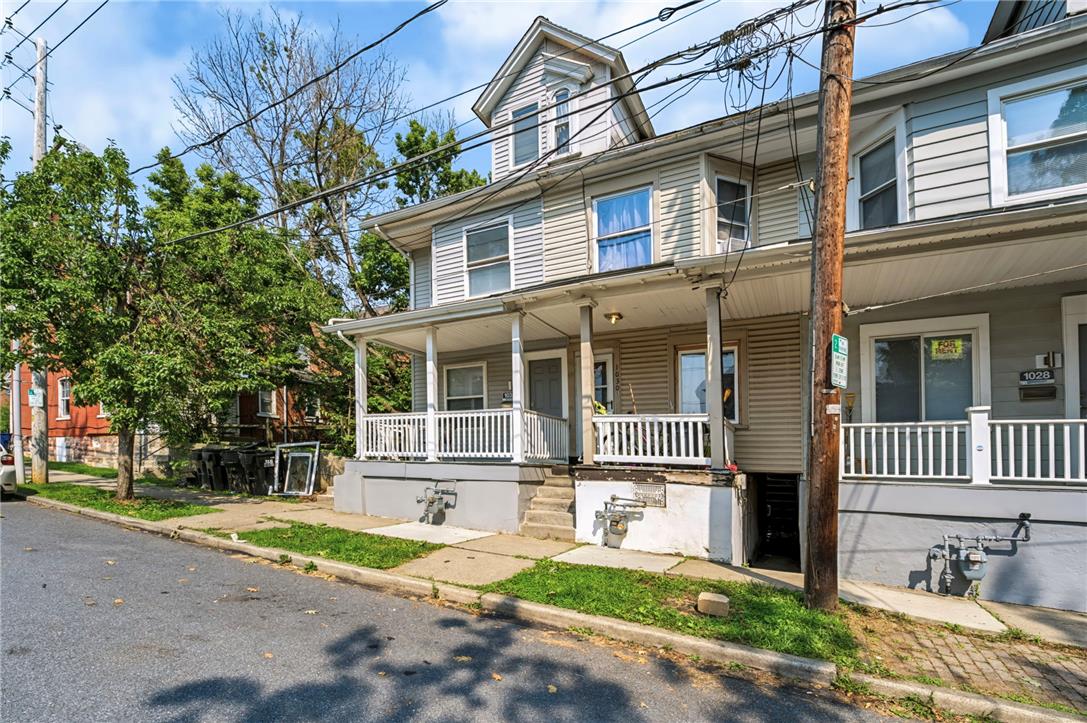 1030 Monocacy Street Bethlehem, PA 18018 - Photo 3 of 34 A welcoming front porch leads into this classic multi-story residence with a gabled roofline.