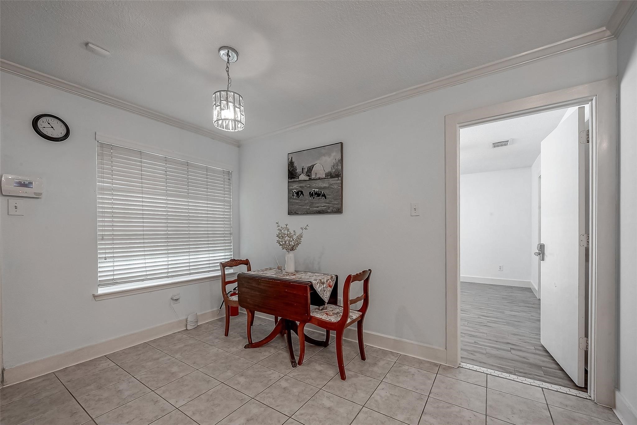 9511 Farrell Drive Houston, TX 77070 - Photo 13 of 28 a view of a dining room with furniture and window
