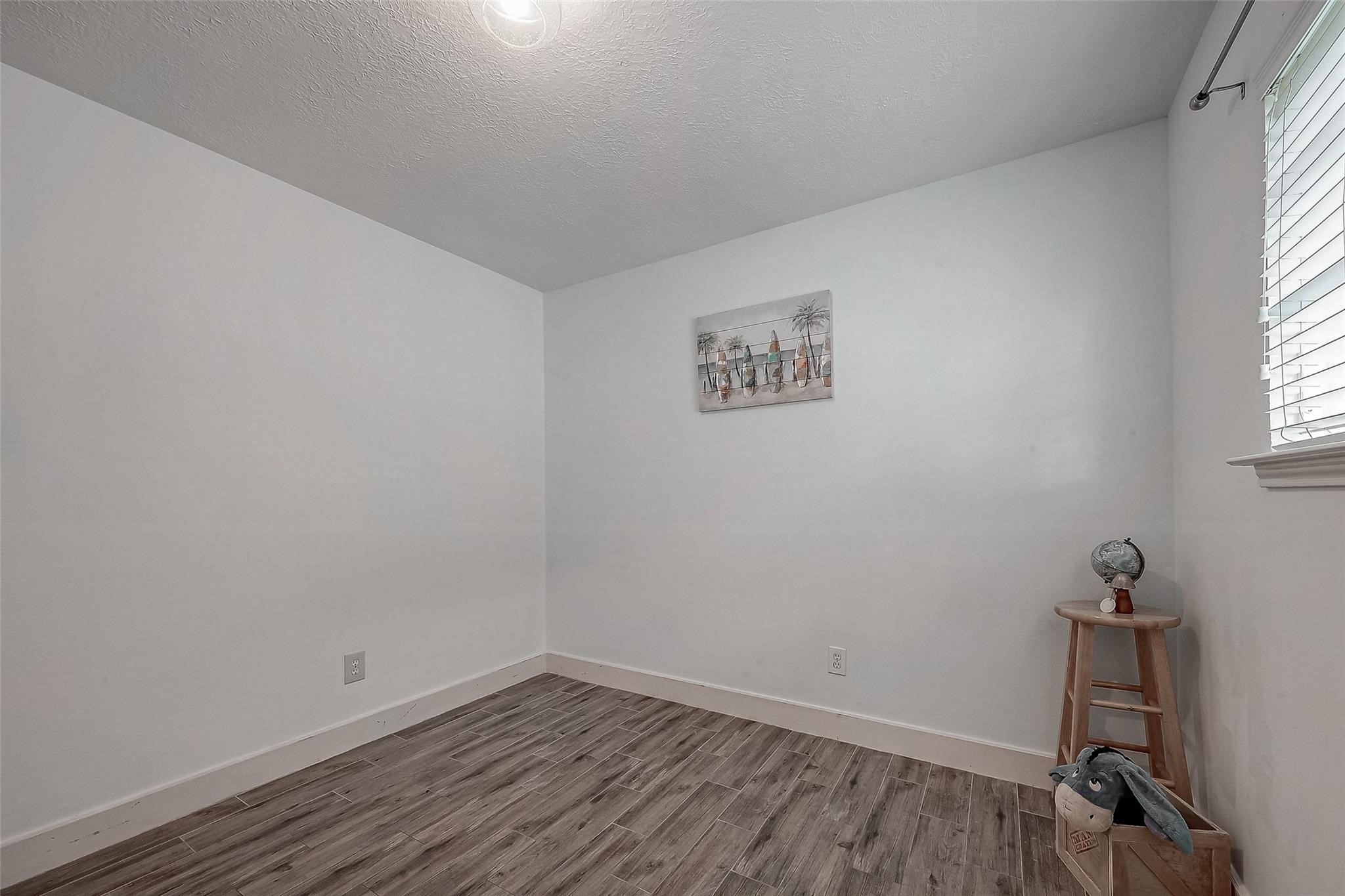 9511 Farrell Drive Houston, TX 77070 - Photo 20 of 28 wooden floor in an empty room