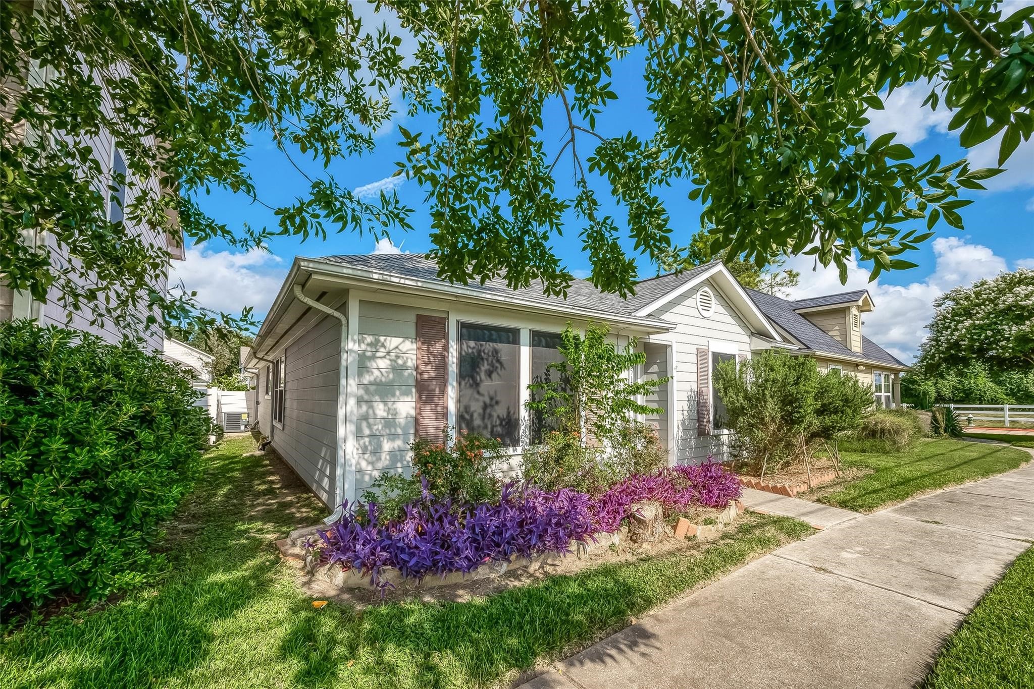 9511 Farrell Drive Houston, TX 77070 - Photo 2 of 28 a front view of a house with garden