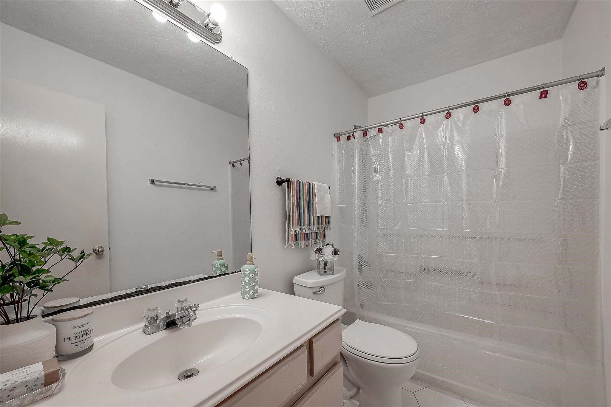 9511 Farrell Drive Houston, TX 77070 - Photo 21 of 28 a bathroom with a sink toilet and shower