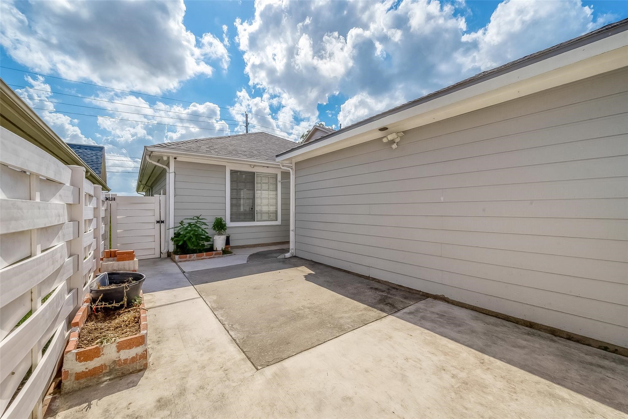 9511 Farrell Drive Houston, TX 77070 - Photo 27 of 28 a view of a backyard with sitting area