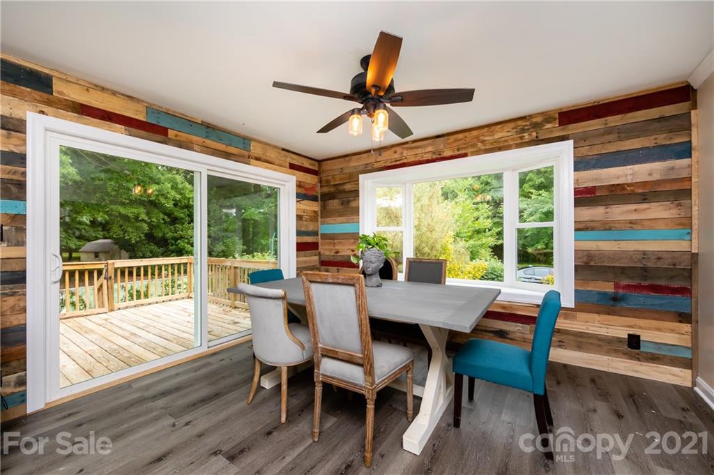 515 Windy Hill Road York, SC 29745 - Photo 24 of 45 a view of a dining room with furniture window and wooden floor
