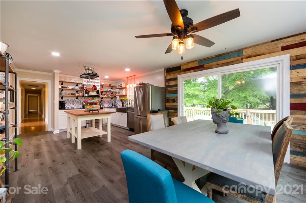 515 Windy Hill Road York, SC 29745 - Photo 25 of 45 a view of a dining room with furniture window and wooden floor