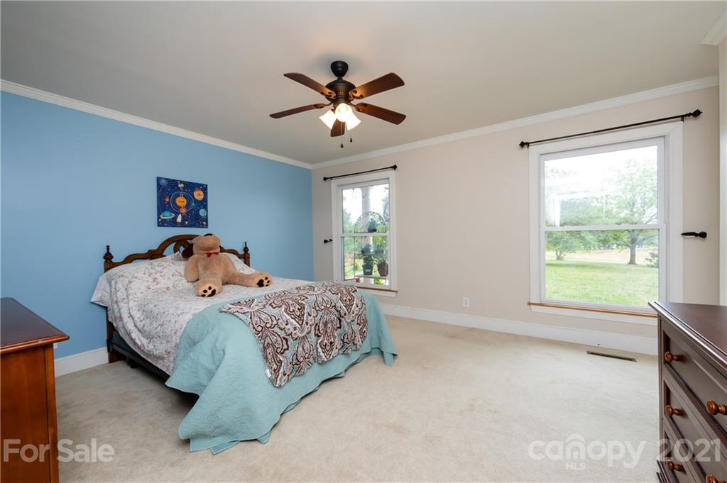 515 Windy Hill Road York, SC 29745 - Photo 33 of 45 a bed room with a bed and a window