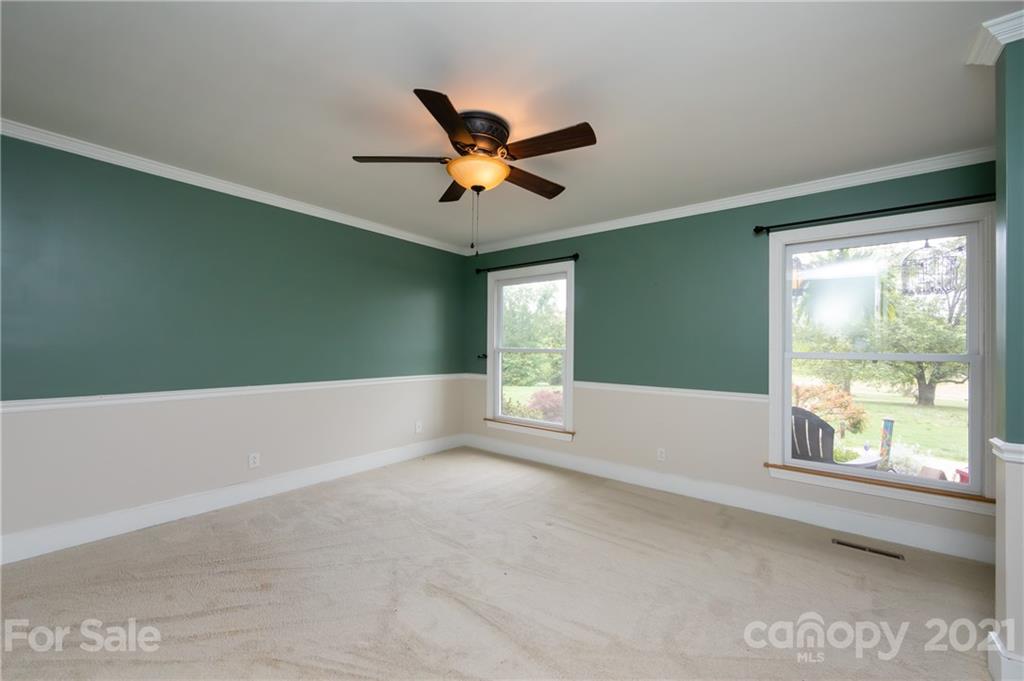 515 Windy Hill Road York, SC 29745 - Photo 9 of 45 a view of room with window and ceiling fan