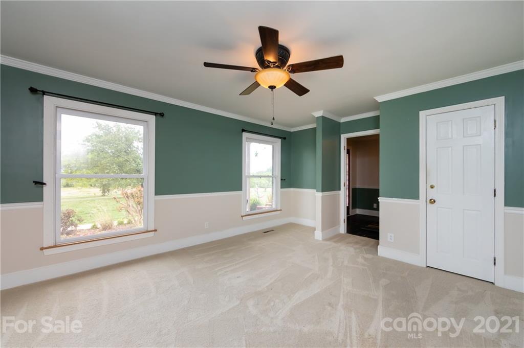 515 Windy Hill Road York, SC 29745 - Photo 10 of 45 a view of empty room with window and ceiling fan
