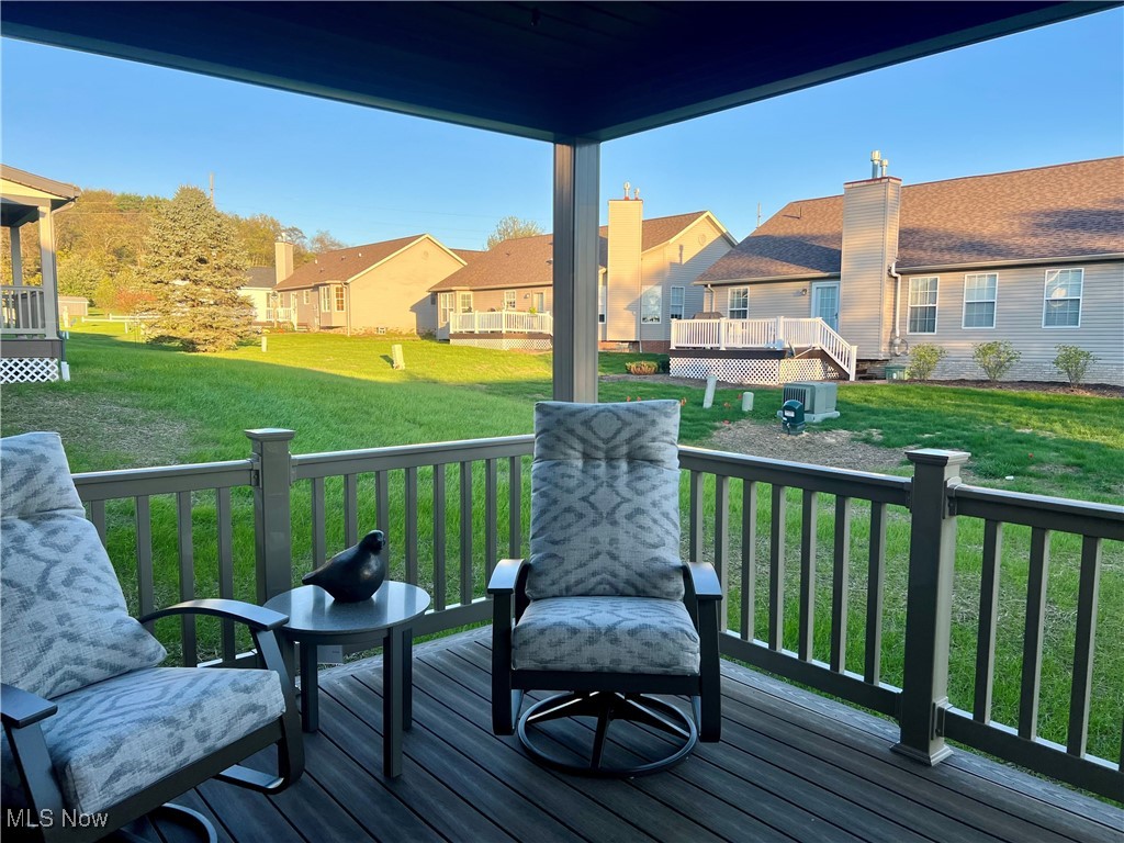 5531 Innkeeper Street Southeast Dennison, OH 44621 - Photo 27 of 30 Wooden deck featuring a yard