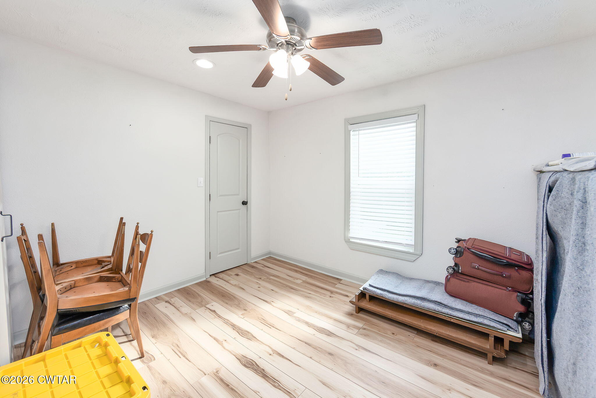 209 Hatton Street Jackson, TN 38301 - Photo 14 of 20 a bedroom with furniture and a window