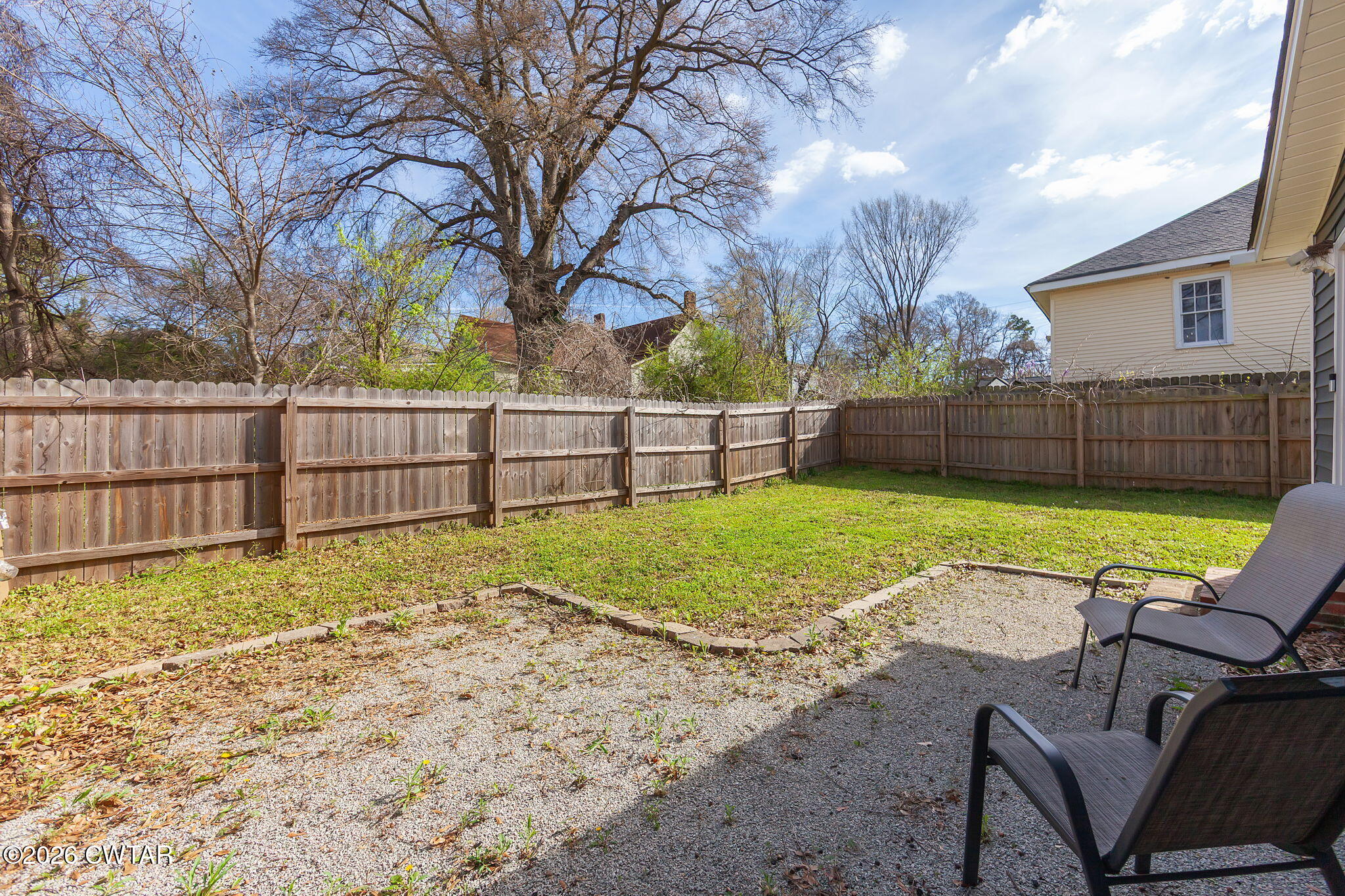 209 Hatton Street Jackson, TN 38301 - Photo 19 of 20 a view of backyard with swimming pool and seating
