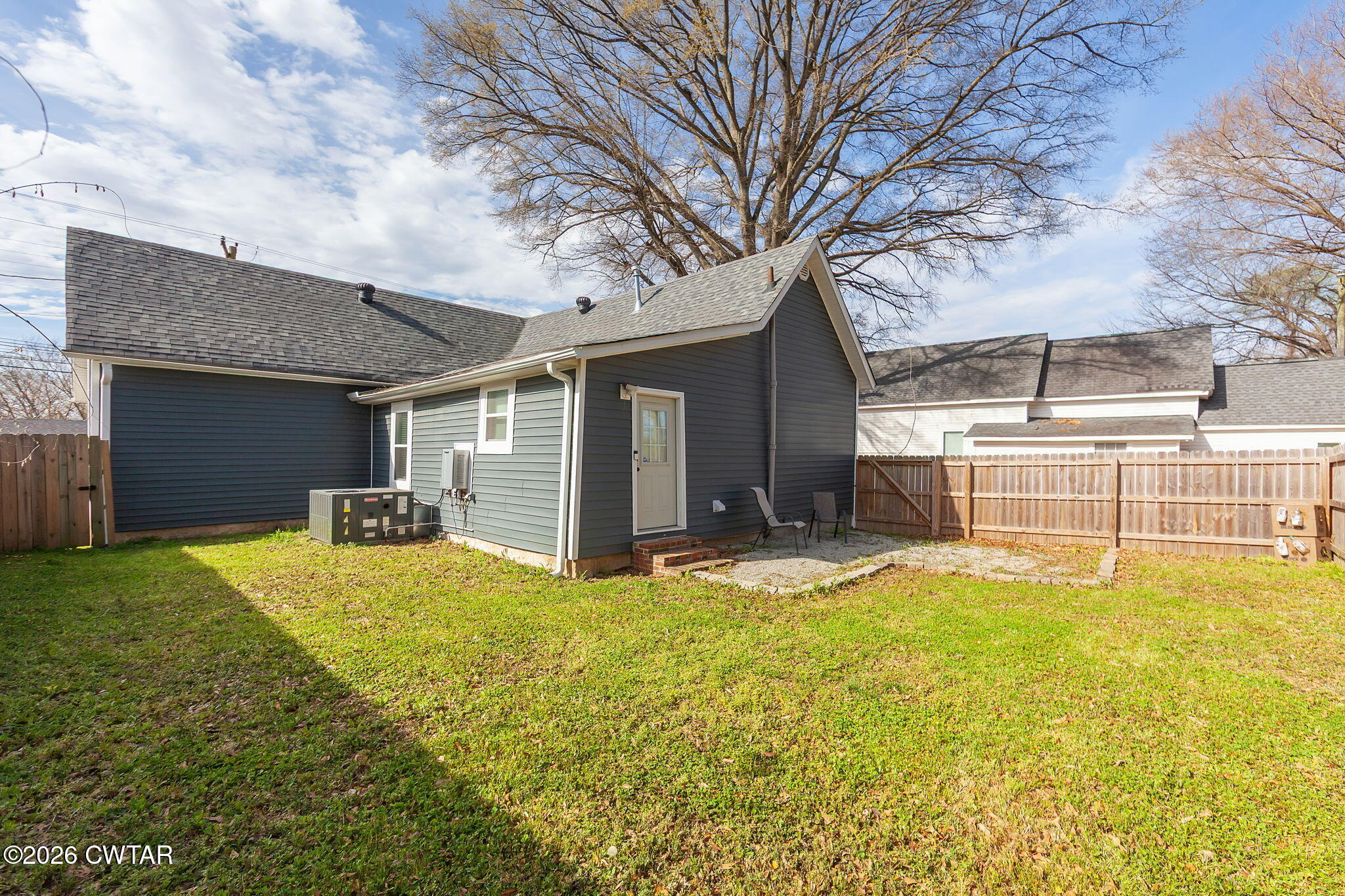 209 Hatton Street Jackson, TN 38301 - Photo 20 of 20 a view of a house with a yard and garage