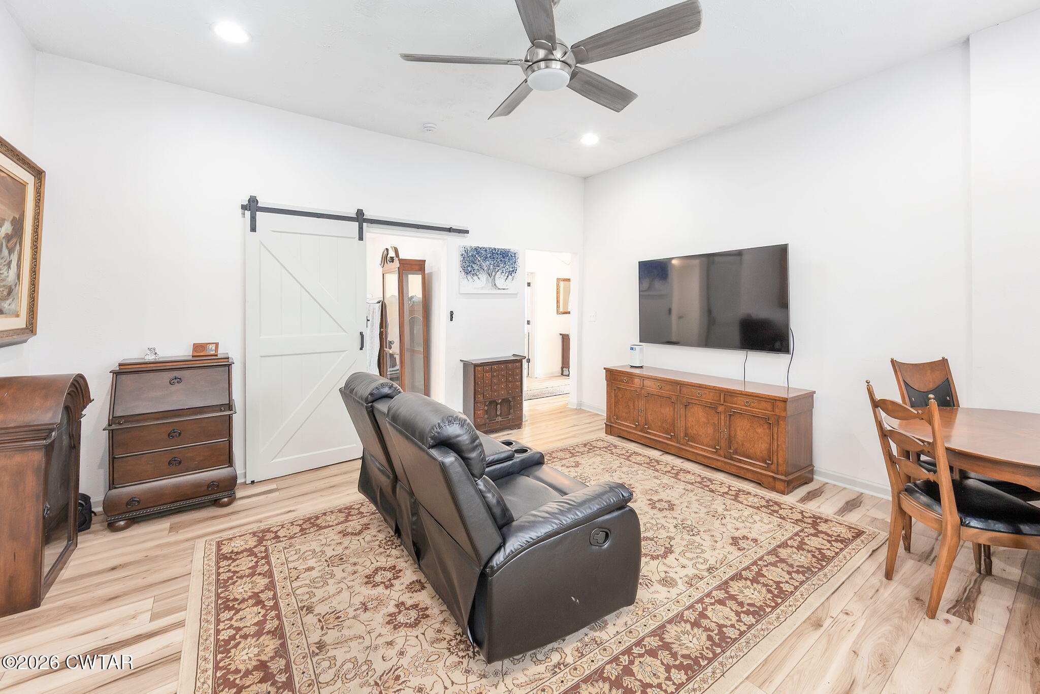 209 Hatton Street Jackson, TN 38301 - Photo 3 of 20 a living room with furniture and a flat screen tv