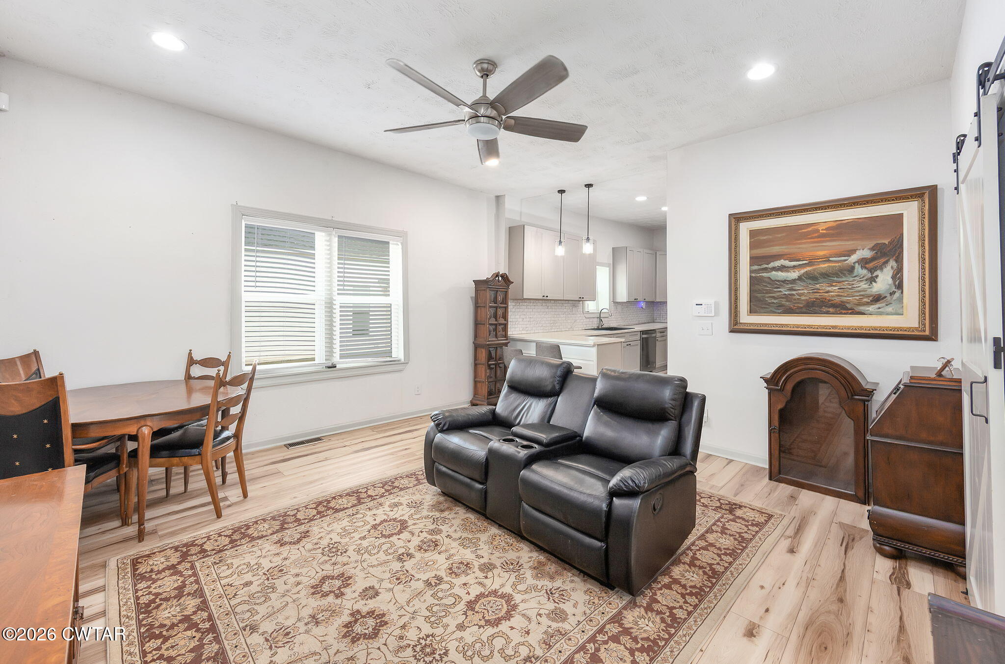 209 Hatton Street Jackson, TN 38301 - Photo 5 of 20 a living room with furniture and a window