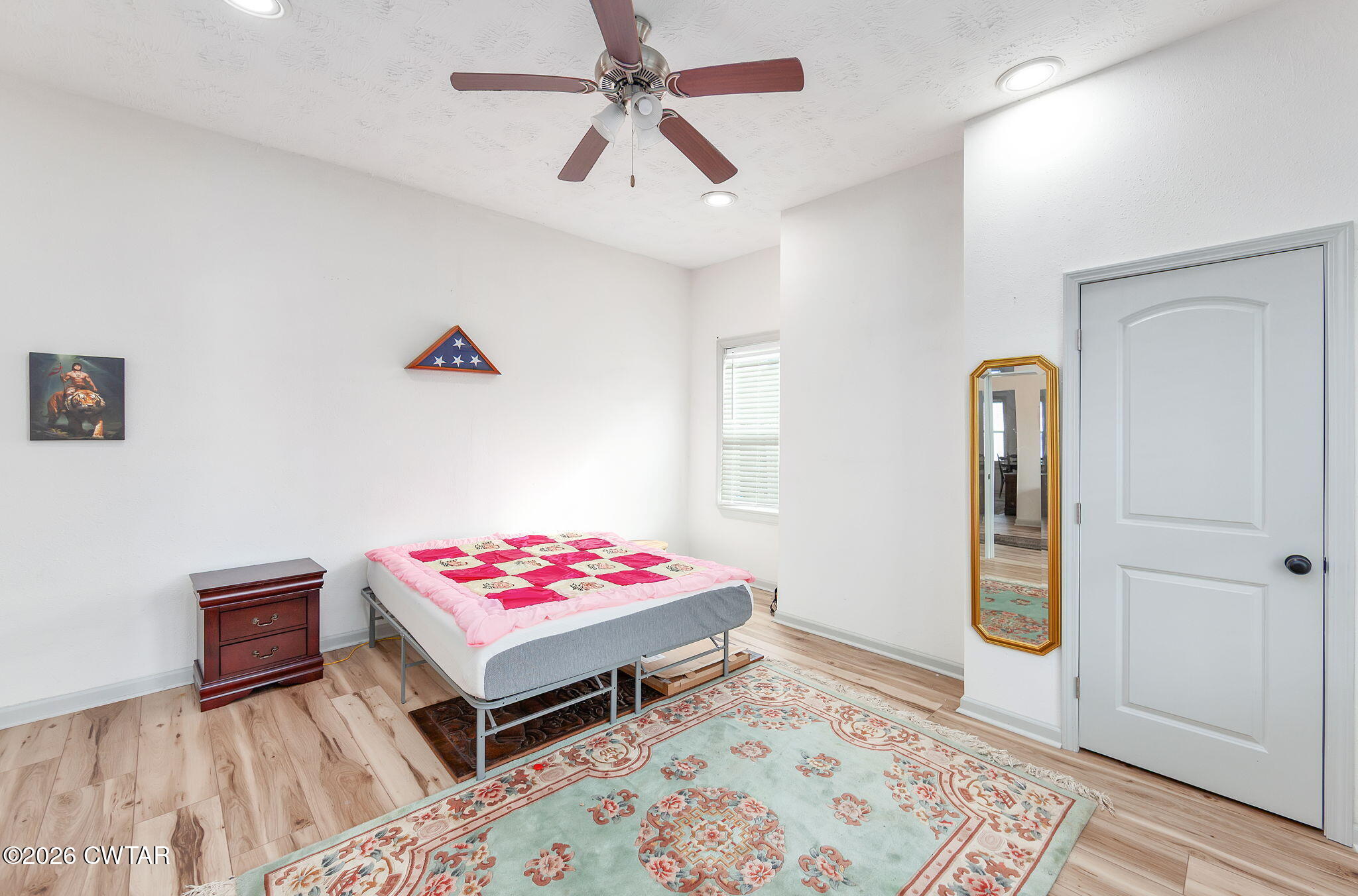 209 Hatton Street Jackson, TN 38301 - Photo 9 of 20 a bedroom with a bed and a window