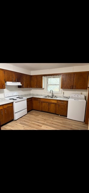 54 High Street South, Unit 54 Barre, MA 01074 - Photo 8 of 10 a view of cabinet with chair and fireplace