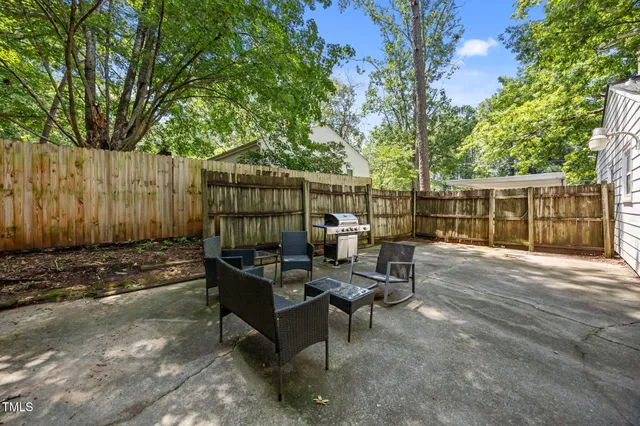 a view of a bench in a backyard