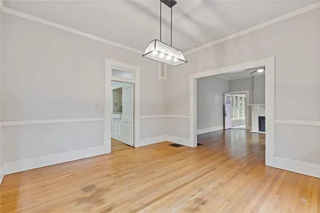 a view of livingroom with hardwood floor and hallway