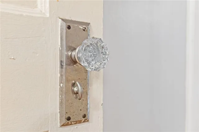 wooden floor fireplace and natural light in room