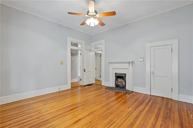 a view of living room that has a fireplace