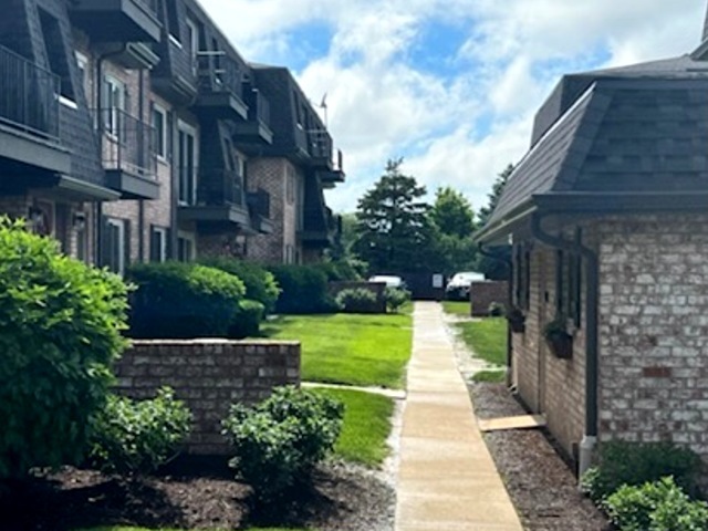 920 South Plum Grove Road, Unit 225 Palatine, IL 60067 - Photo 14 of 15 a view of a pathway both side of the house