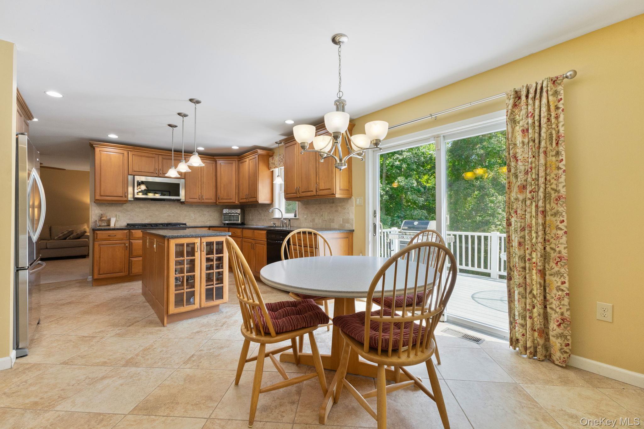 9 Windswept Circle Brewster, NY 10509 - Photo 14 of 43 a view of a dining room with furniture window and outside view