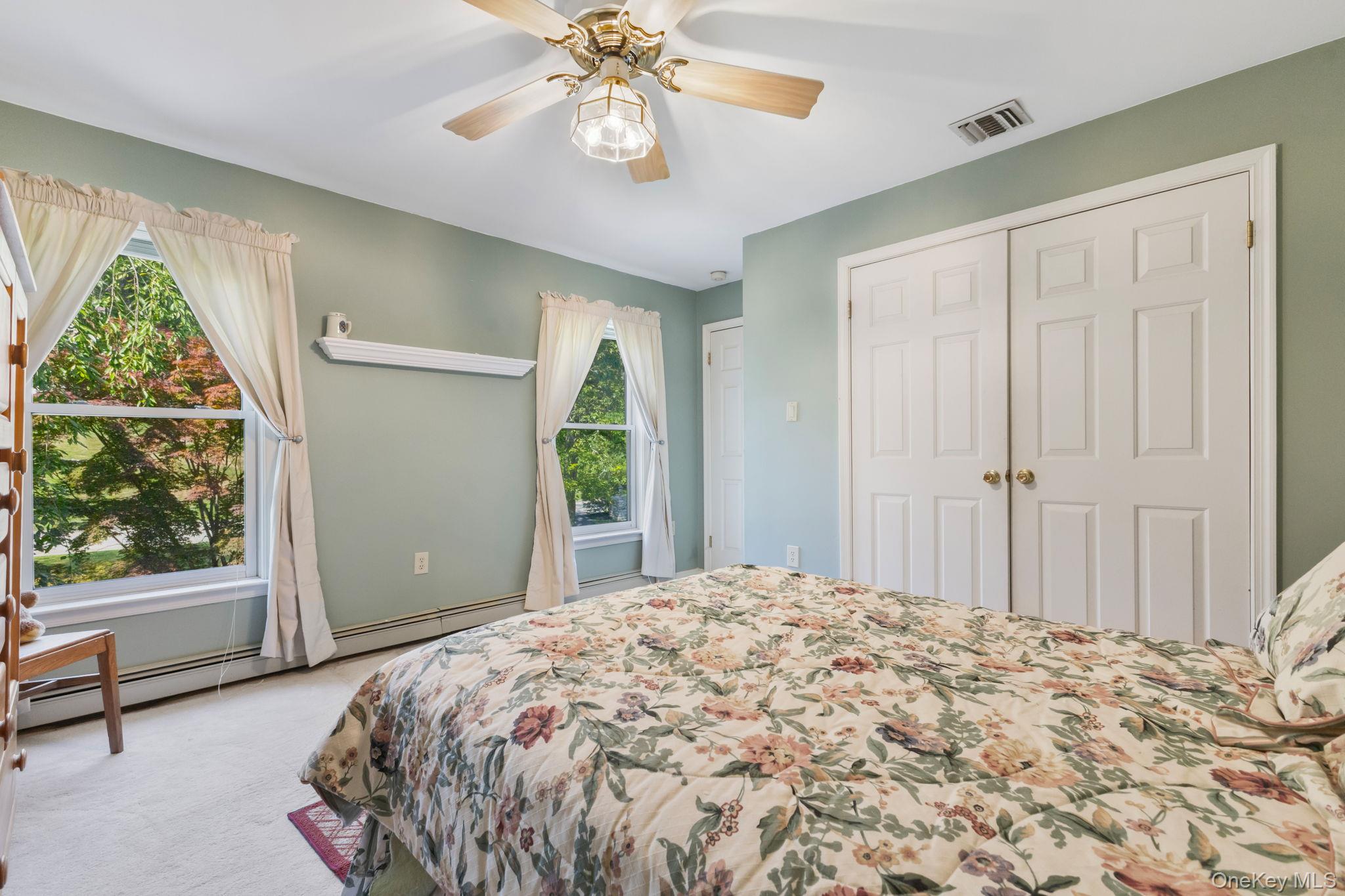 9 Windswept Circle Brewster, NY 10509 - Photo 29 of 43 a bedroom with a bed and a window