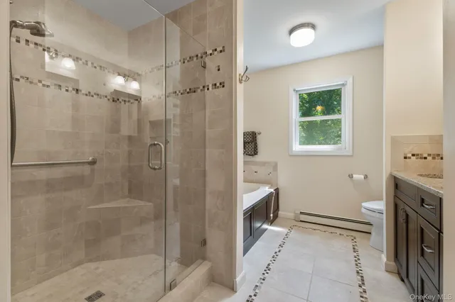 a bathroom with a sink and a shower