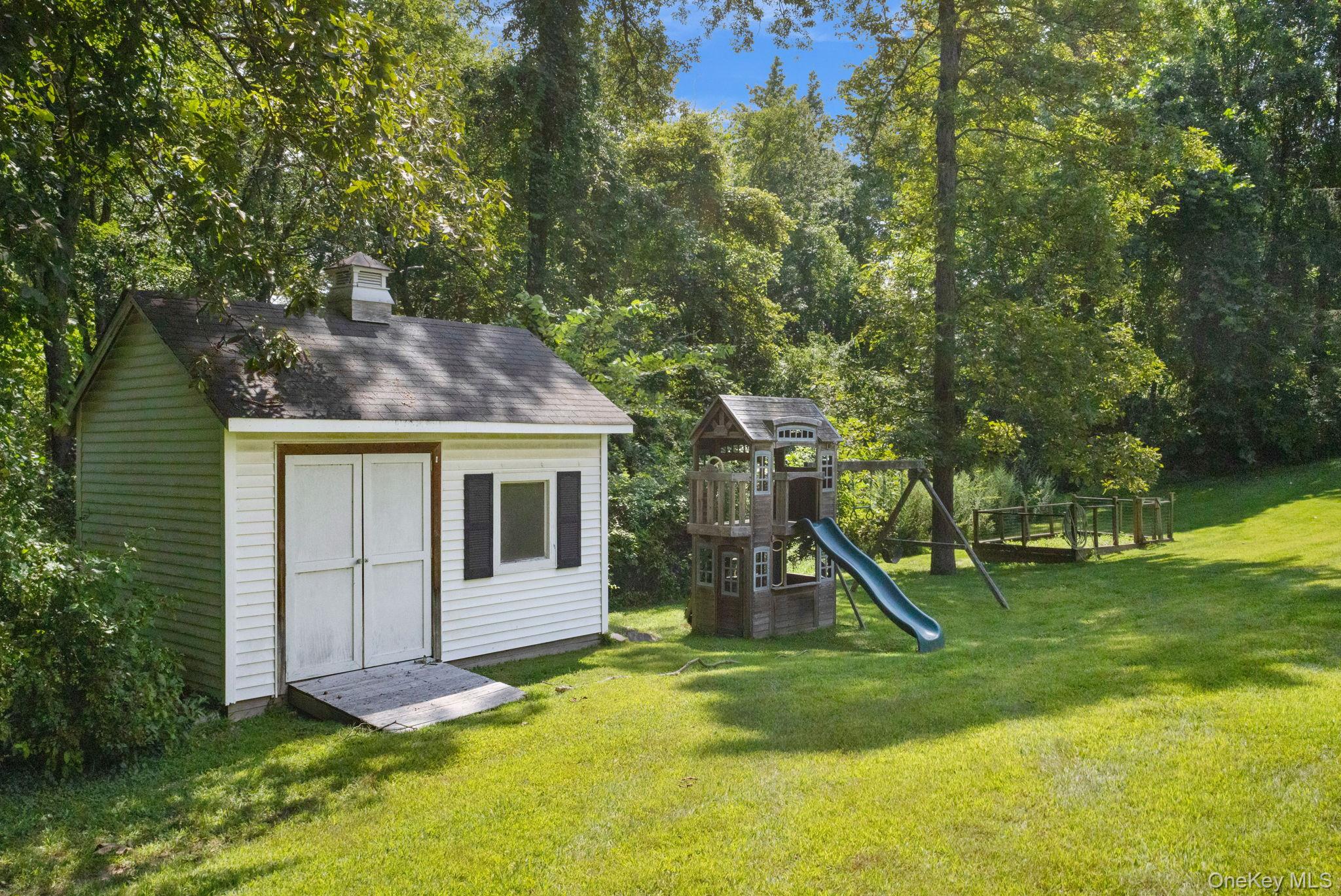 9 Windswept Circle Brewster, NY 10509 - Photo 39 of 43 a view of a house with a park
