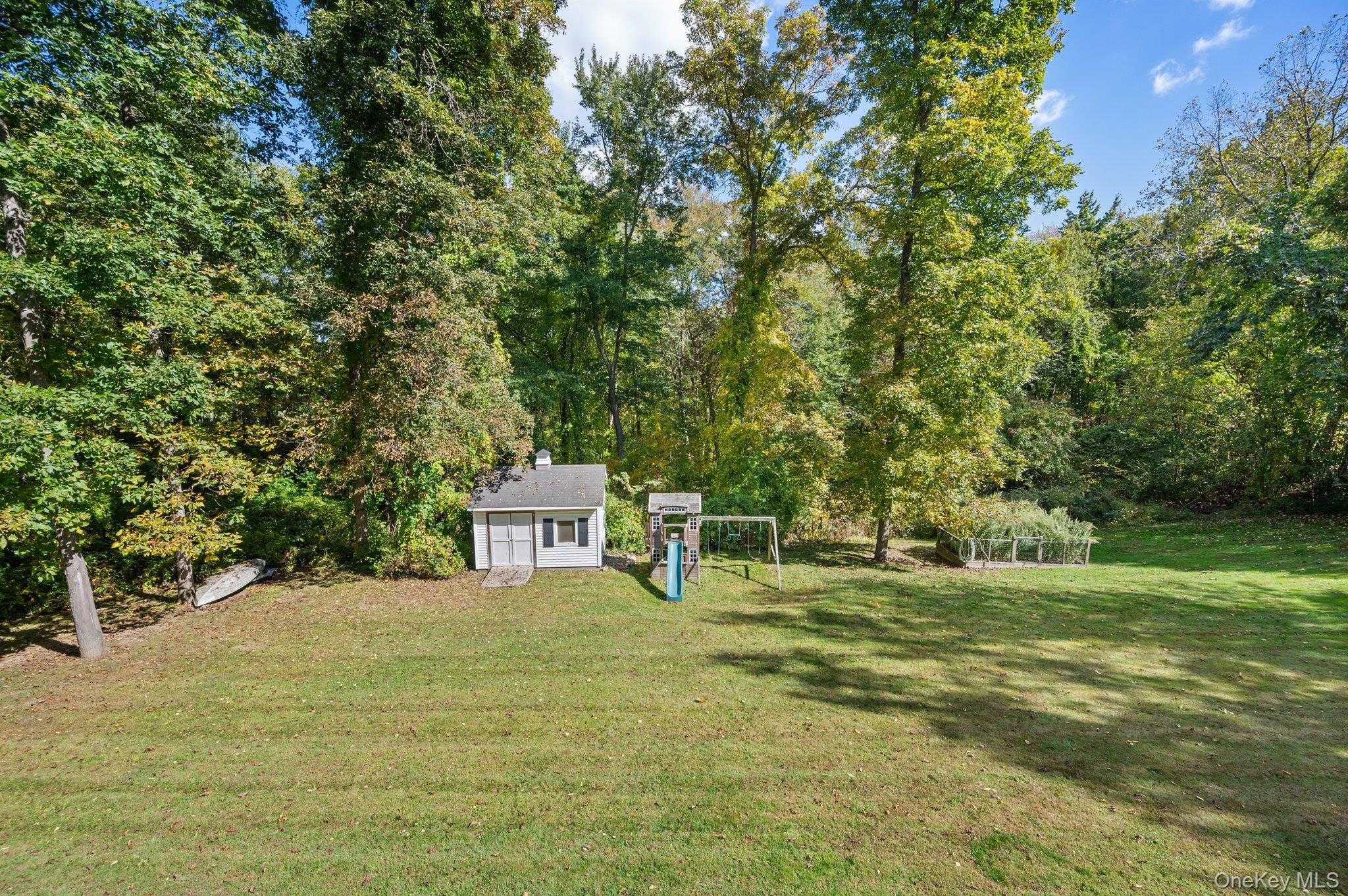 9 Windswept Circle Brewster, NY 10509 - Photo 6 of 43 a view of a house with a yard