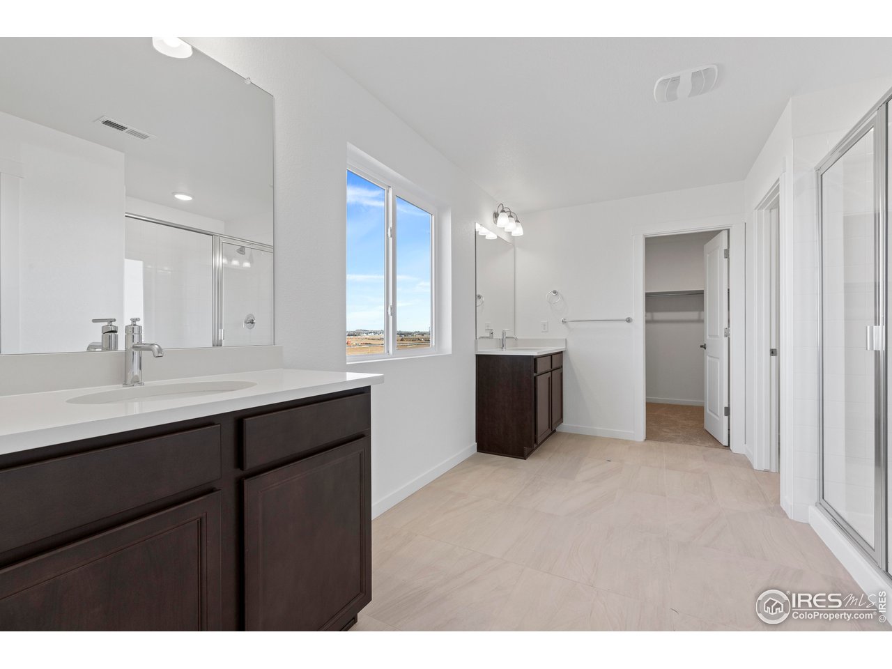 1472 Boyle Street Windsor, CO 80550 - Photo 19 of 25 a kitchen with a sink and cabinets