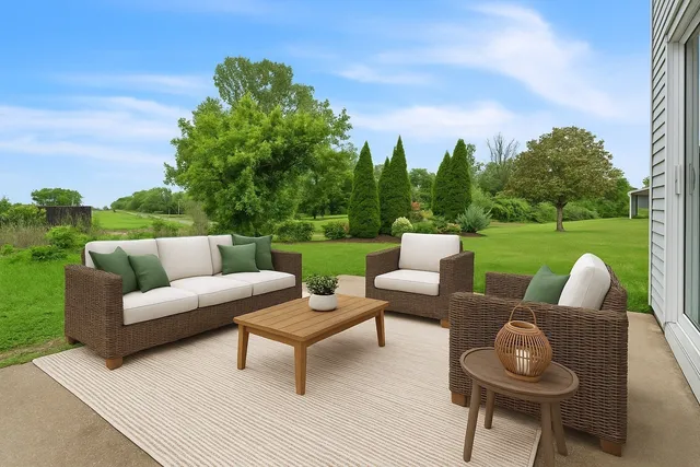 a view of a house with backyard and garden