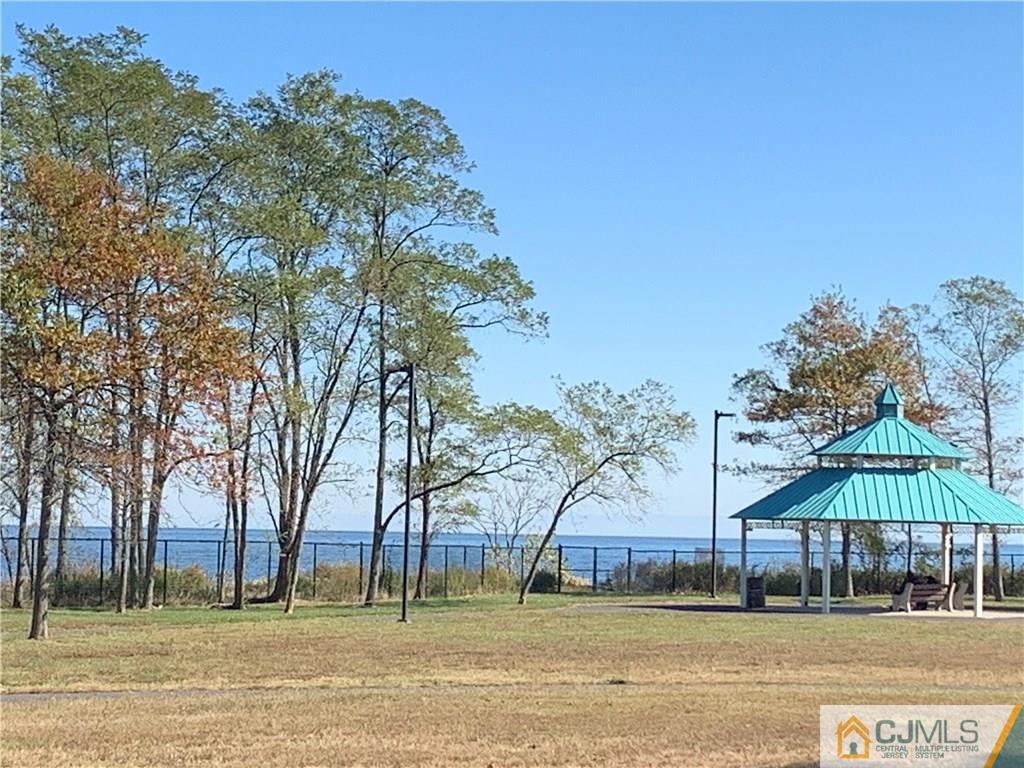 413 Harding Road Old Bridge, NJ 08879 - Photo 2 of 18 a view of a town with palm trees