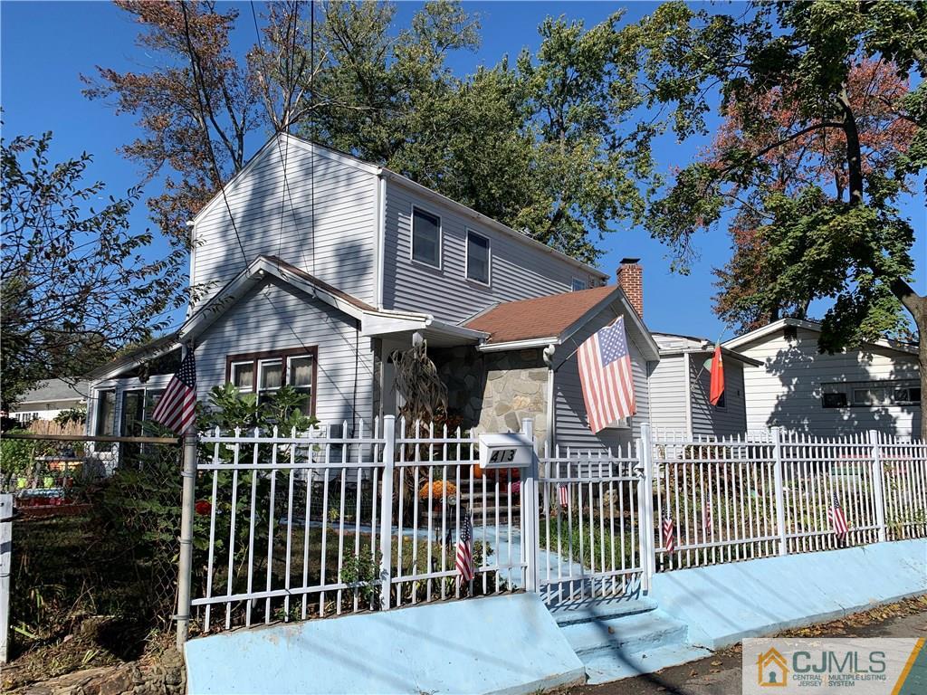 413 Harding Road Old Bridge, NJ 08879 - Photo 18 of 18 a front view of a house with a garden