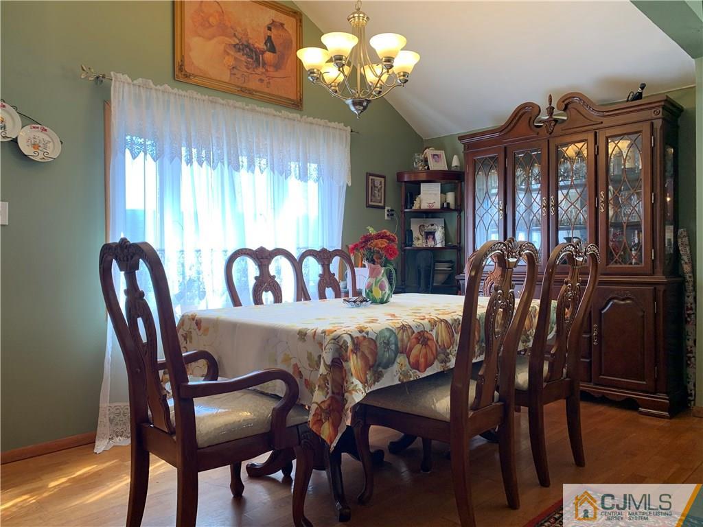 413 Harding Road Old Bridge, NJ 08879 - Photo 4 of 18 a view of a dining room with furniture window and outside view