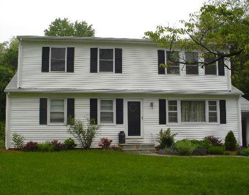 30 Meadow Road Trumbull, CT 06611 - Photo 1 of 1 a front view of a house with a yard