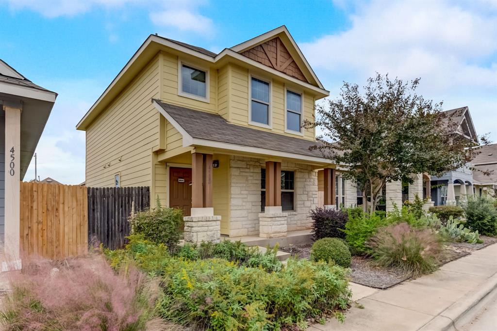 4502 Kind Way Austin, TX 78725 - Photo 1 of 13 Craftsman inspired home with stone siding and a porch