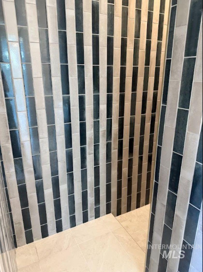 755 West Wrangler Street Meridian, ID 83646 - Photo 11 of 35 Vertical tile arrangement featuring alternating dark and light rectangular tiles