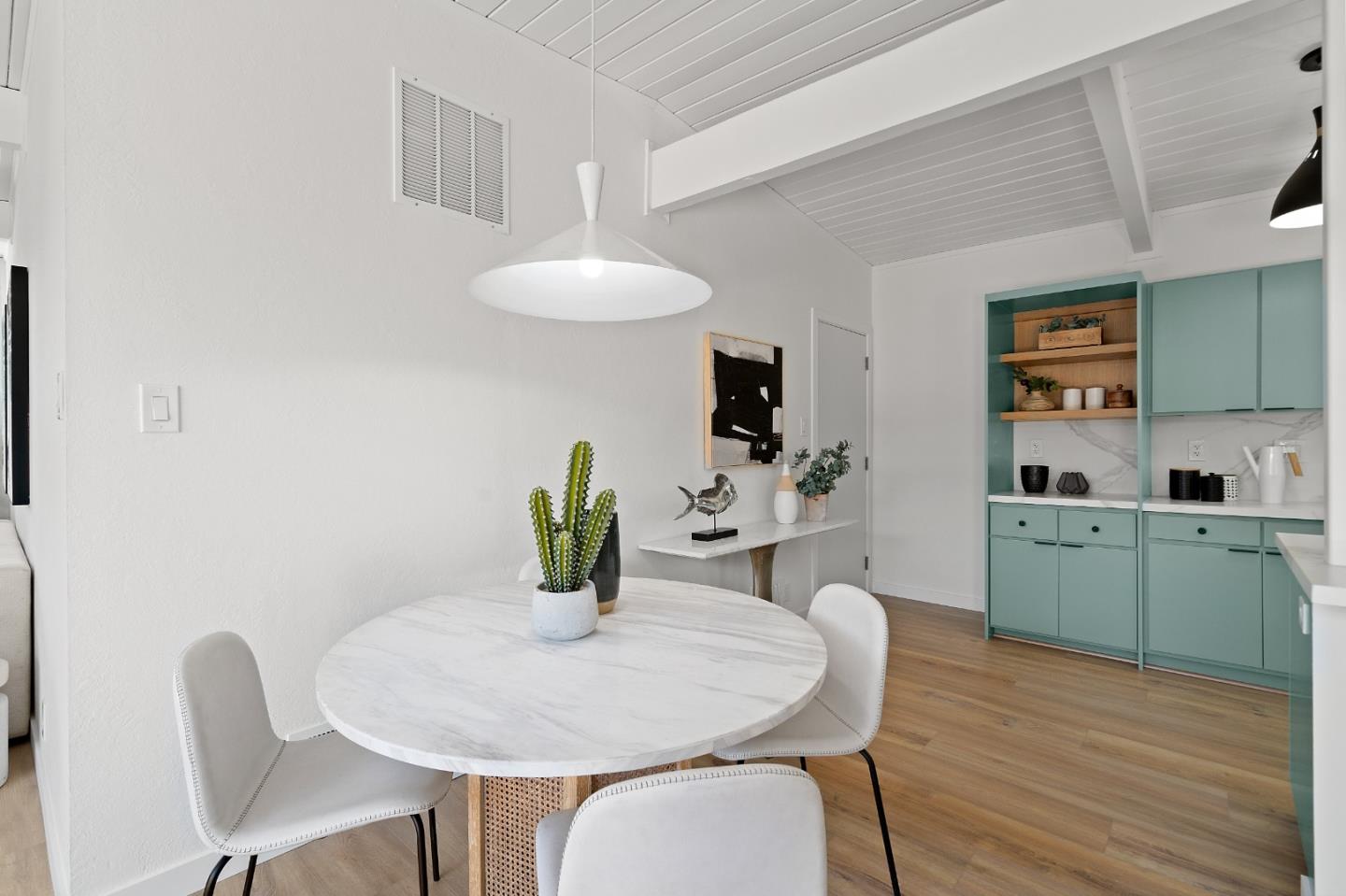 1669 Eleanor Drive San Mateo, CA 94402 - Photo 12 of 31 a view of a dining room with furniture and wooden floor