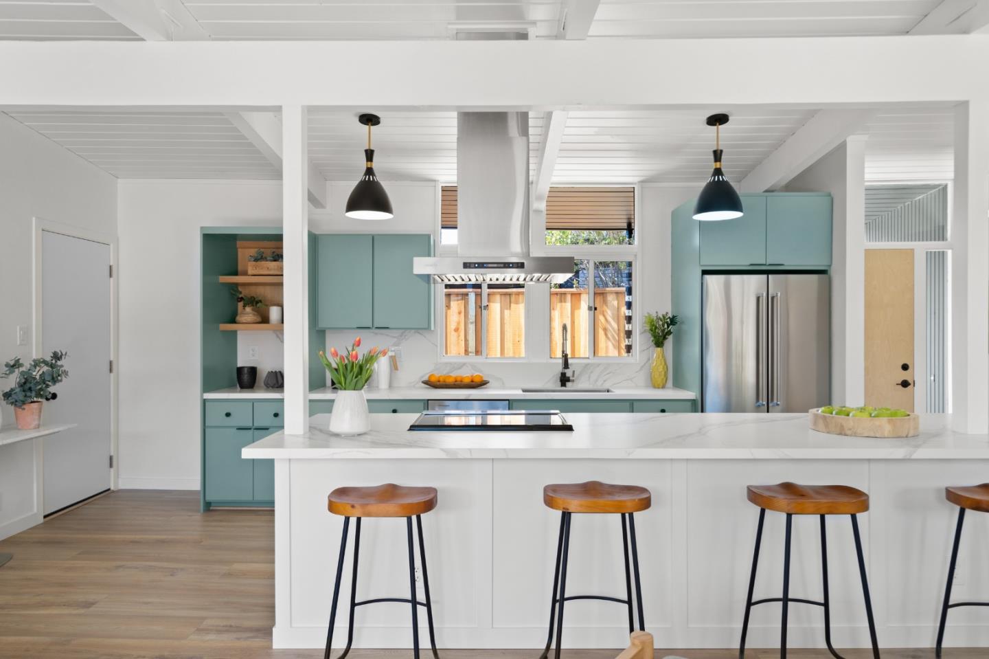 1669 Eleanor Drive San Mateo, CA 94402 - Photo 13 of 31 a kitchen with stainless steel appliances kitchen island granite countertop wooden floor and sink