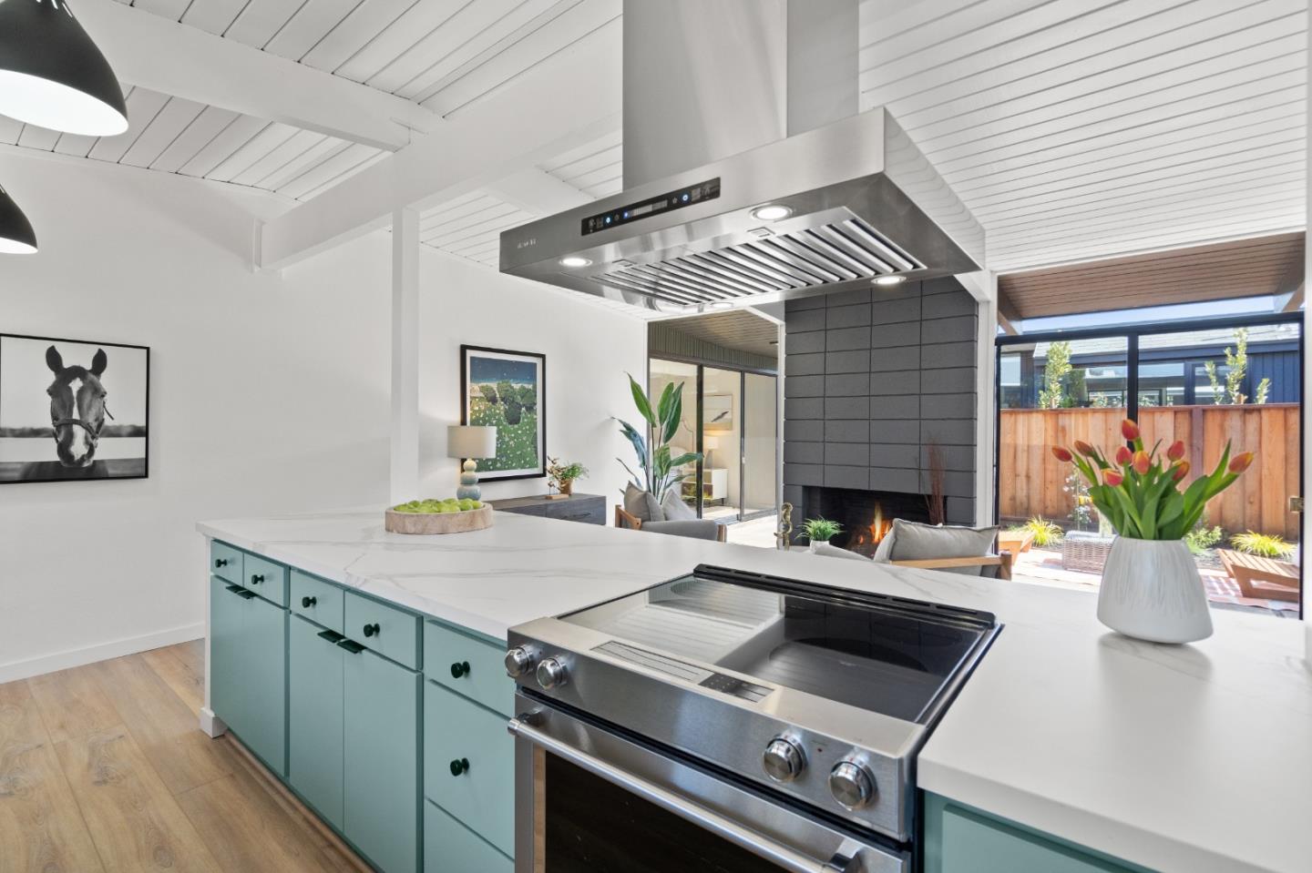1669 Eleanor Drive San Mateo, CA 94402 - Photo 15 of 31 a kitchen with a sink and stove