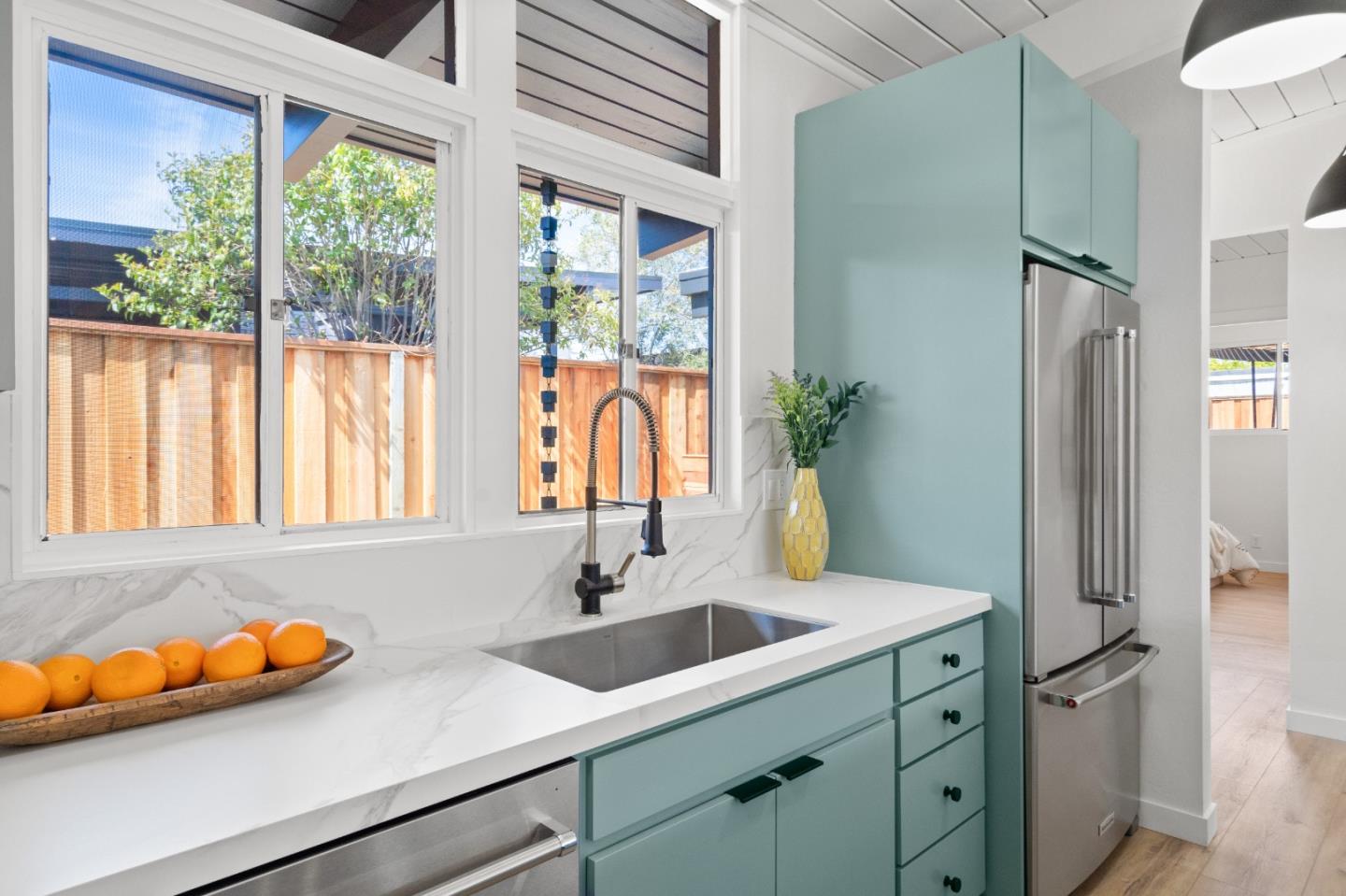1669 Eleanor Drive San Mateo, CA 94402 - Photo 16 of 31 a kitchen with a sink and a window