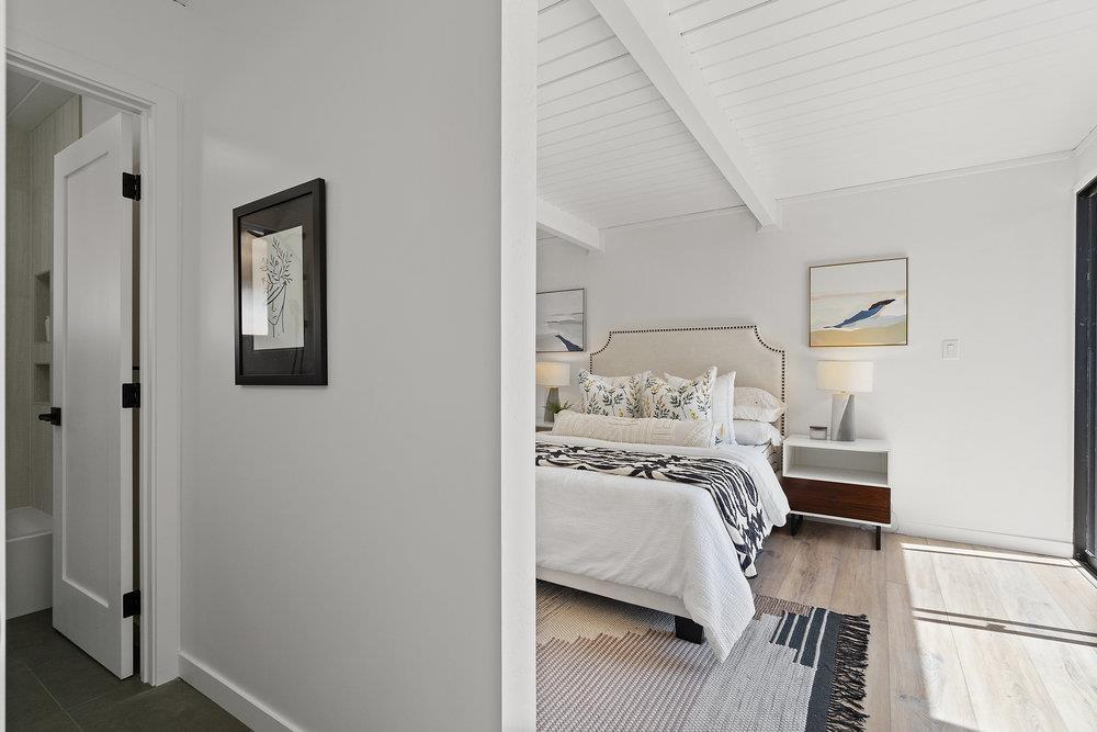 1669 Eleanor Drive San Mateo, CA 94402 - Photo 20 of 31 a bedroom with a bed and wooden floor