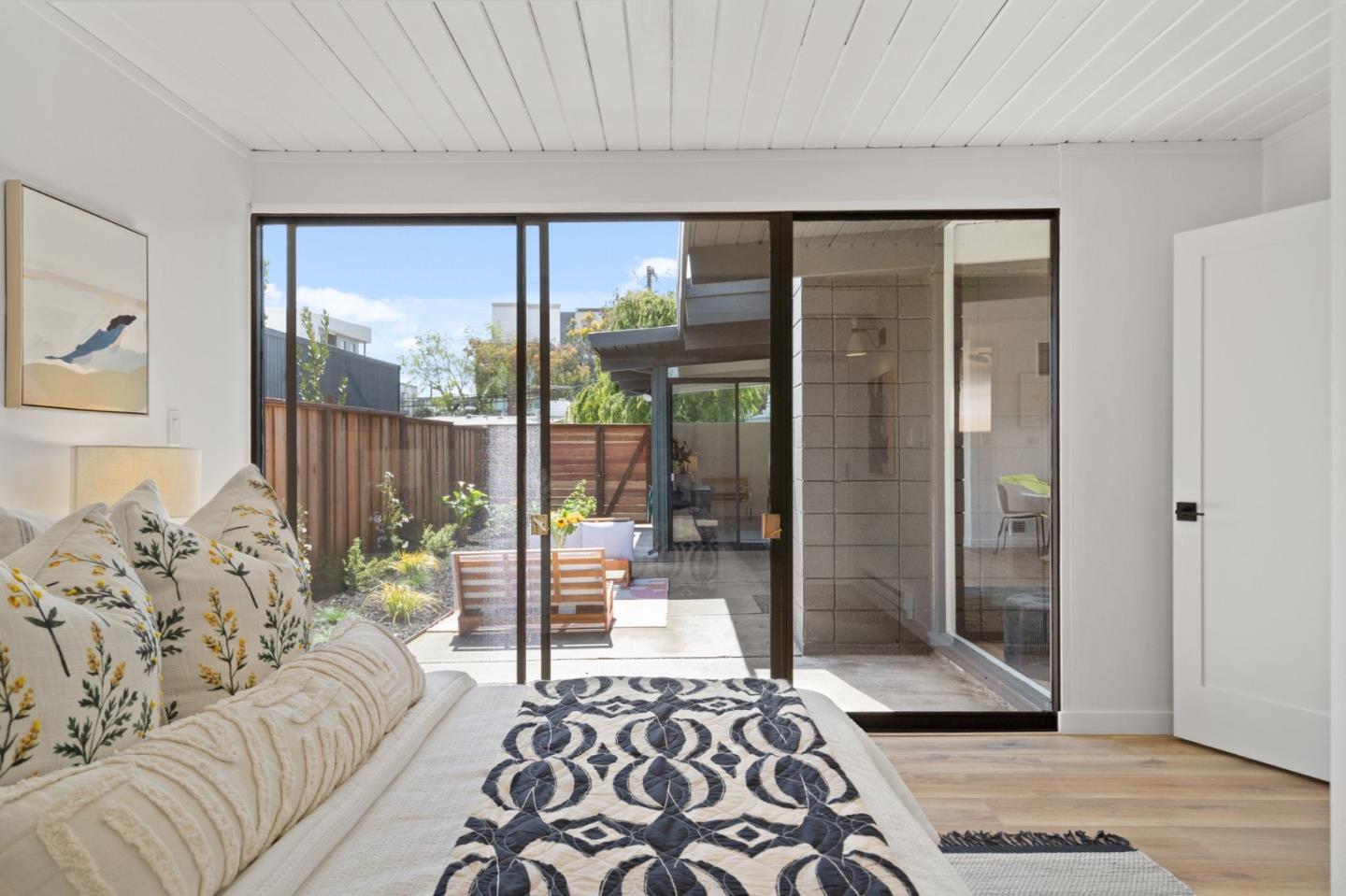 1669 Eleanor Drive San Mateo, CA 94402 - Photo 23 of 31 a bedroom with furniture and large windows