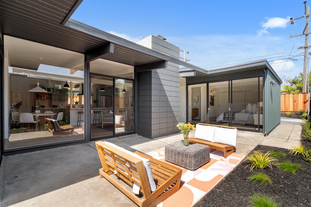 1669 Eleanor Drive San Mateo, CA 94402 - Photo 30 of 31 a building outdoor space with patio furniture and glass door