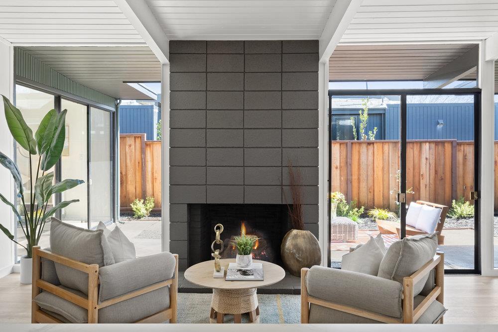 1669 Eleanor Drive San Mateo, CA 94402 - Photo 7 of 31 a living room with furniture and a fireplace