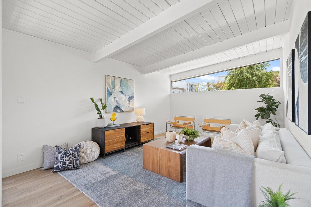 1669 Eleanor Drive San Mateo, CA 94402 - Photo 8 of 31 a living room with furniture and a table