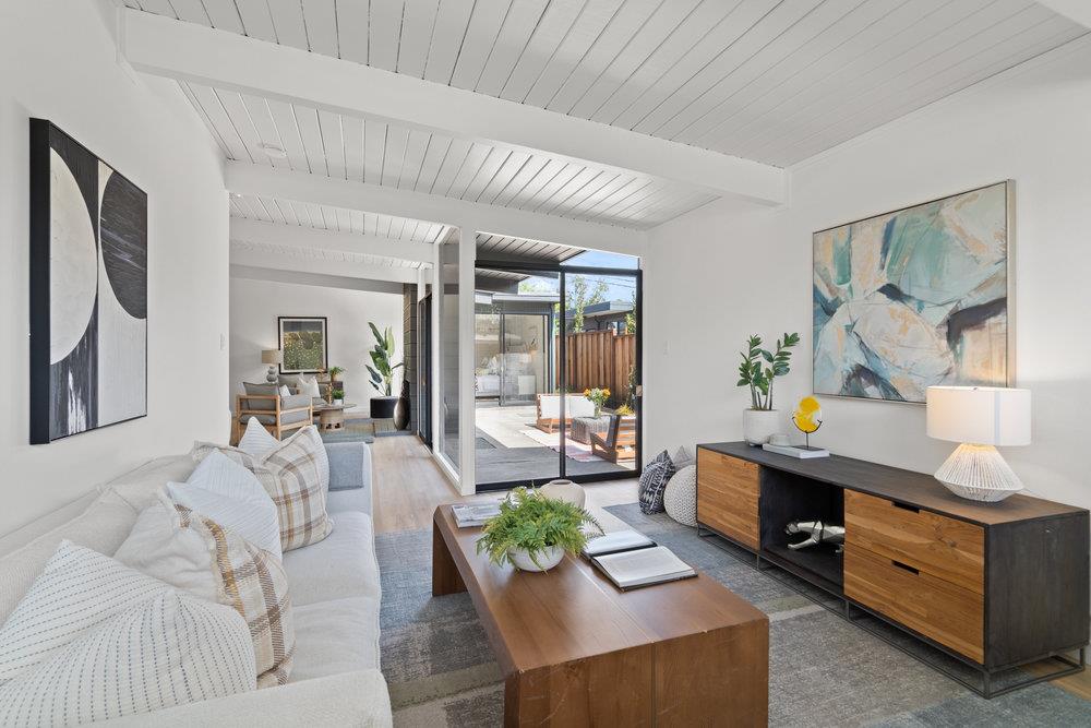 1669 Eleanor Drive San Mateo, CA 94402 - Photo 9 of 31 a living room with furniture and a table