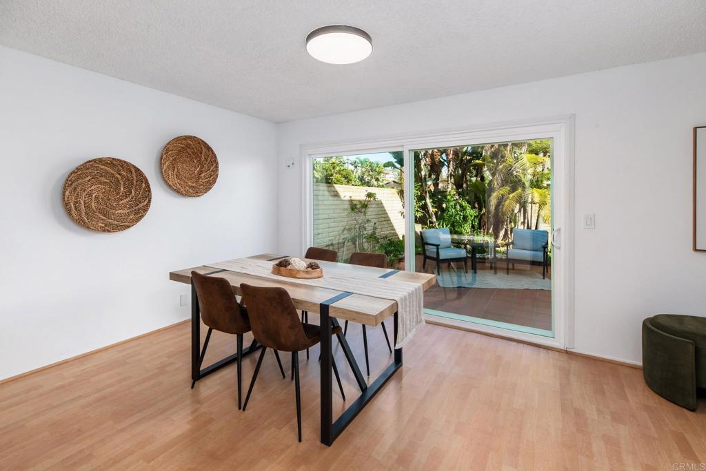 201 4th Street, Unit A/B Encinitas, CA 92024 - Photo 14 of 33 a view of a dining room with furniture window and outside view